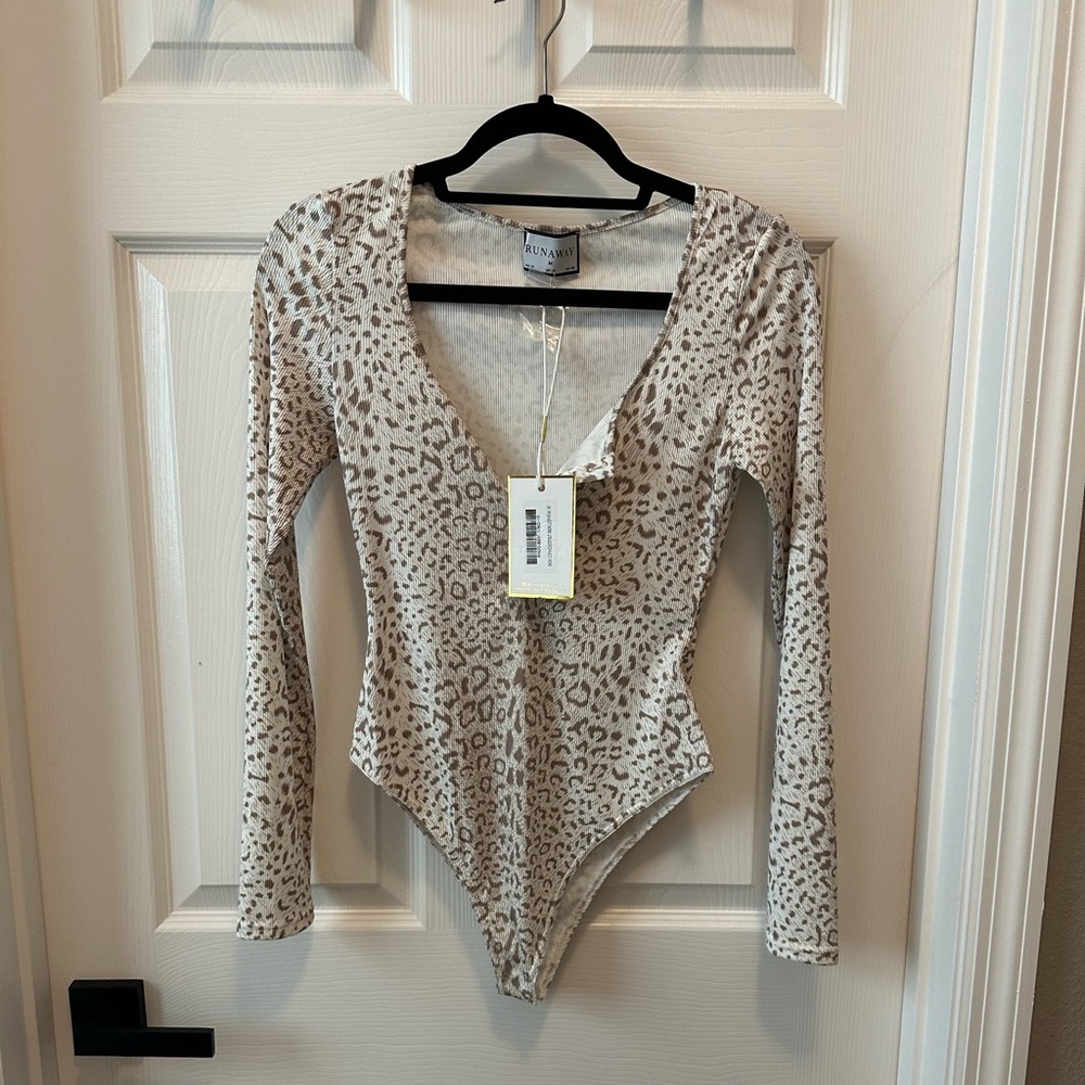 NEVER WORN! Leopard print body suit.